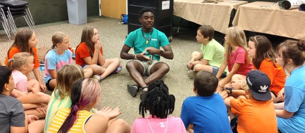 Campers learn about snakes.